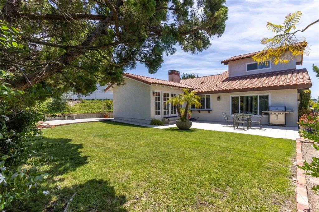 Lovely, open backyard with grassy area and...
