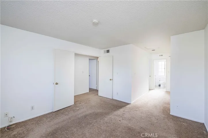 Primary suite hall to primary bath