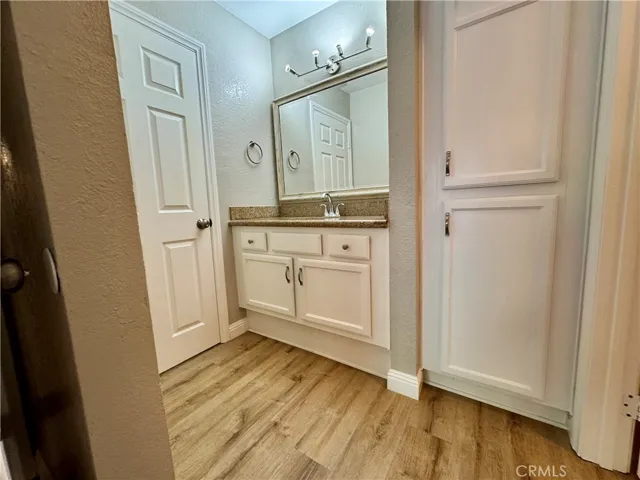 1 1/4 shared bathroom, separate vanity areas