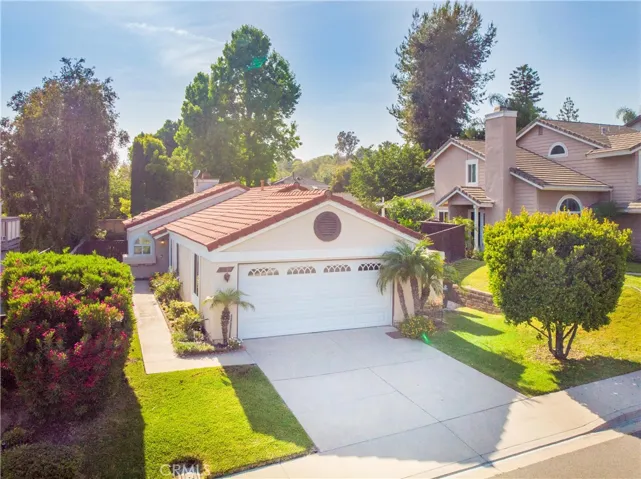 Front of home with large driveway