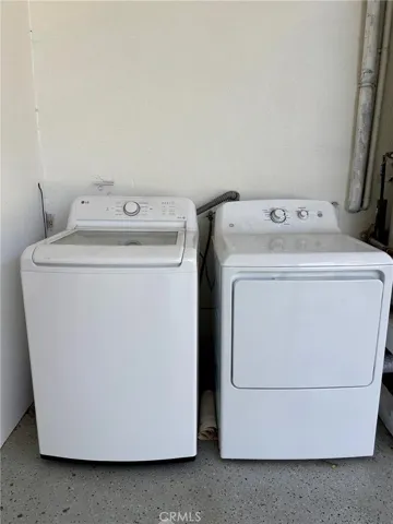 Complimemtary Washer and Dryer in Carport