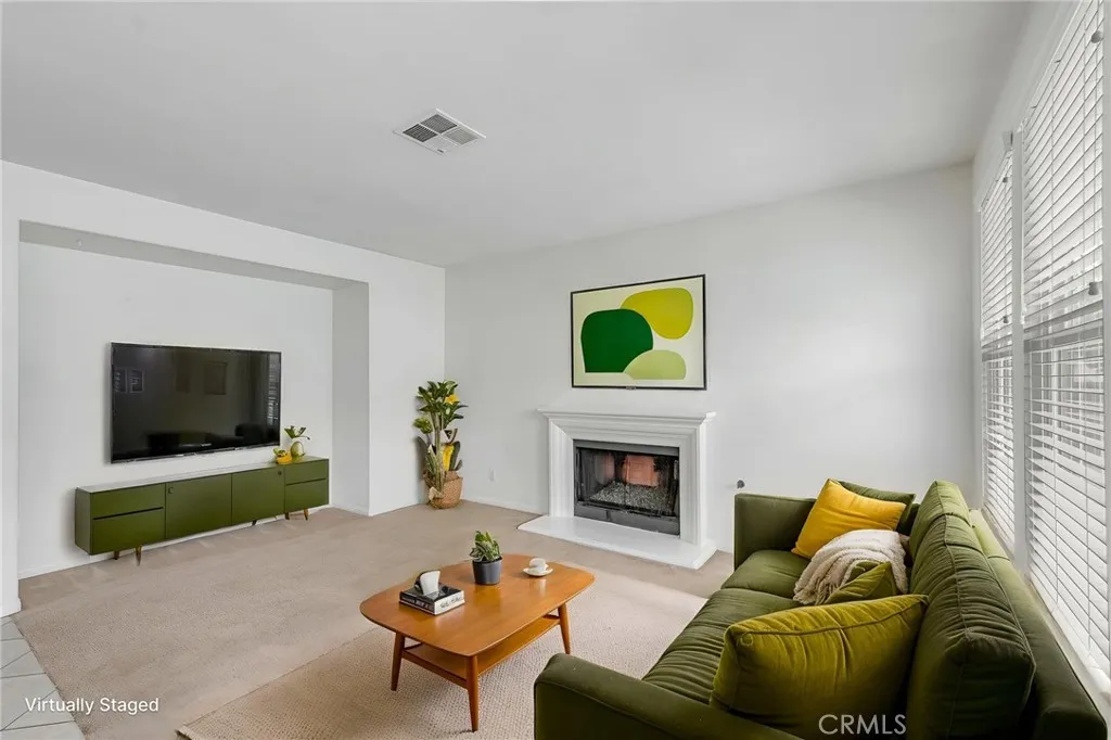 Family room virtually staged, or you can do the way you like