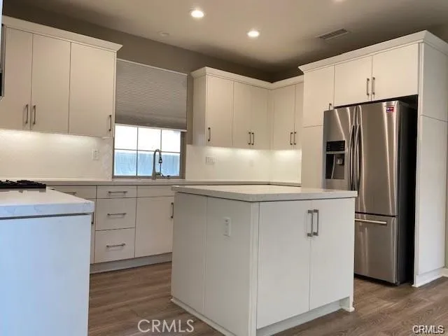 Large open kitchen with Quartz Counter tops.