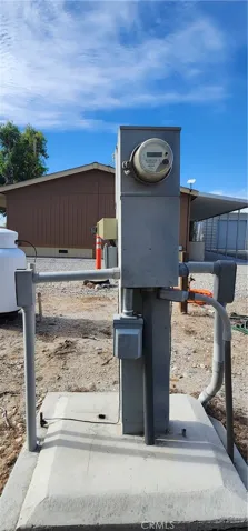 Electric meter serves house and garage