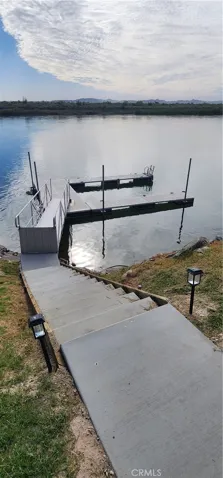 New concrete stairway leading down to your own private dock
