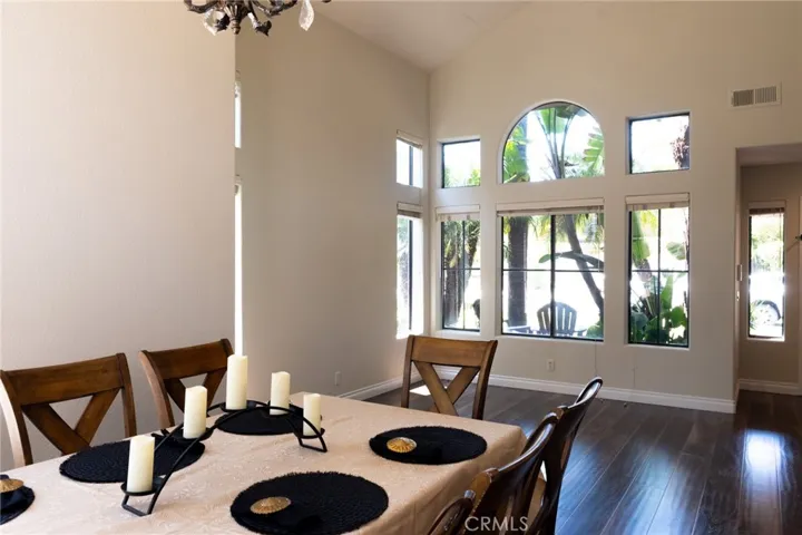 Dining area with view of living room windowscape