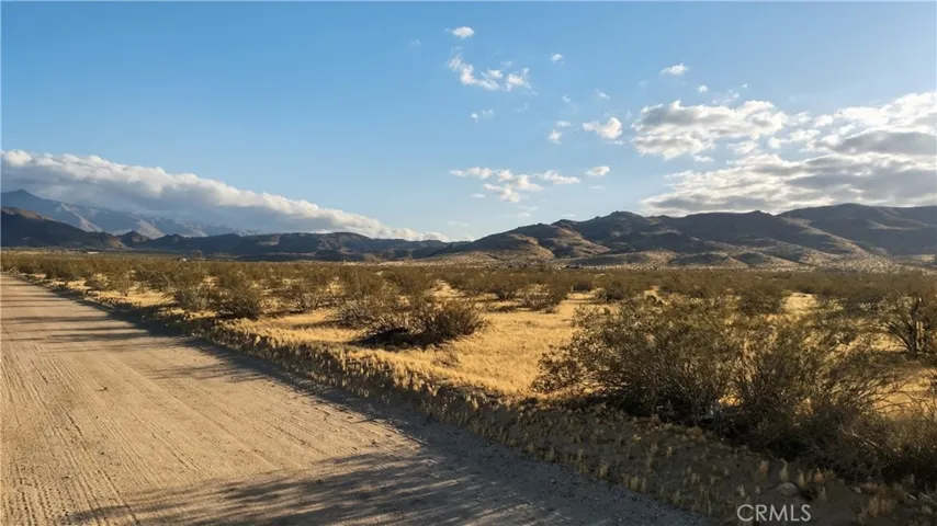 Looking South, from property, at road