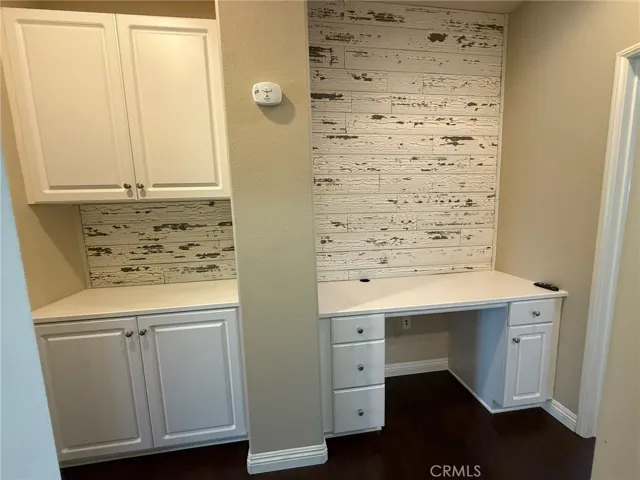 hallway storage and desk area