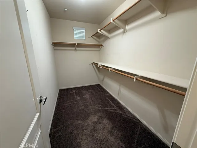 primary bedroom walkin closet