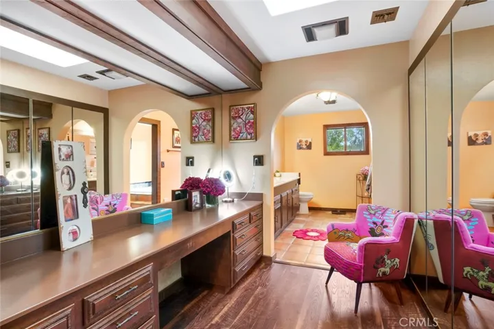 Primary suite with 2 separate bathroom areas.