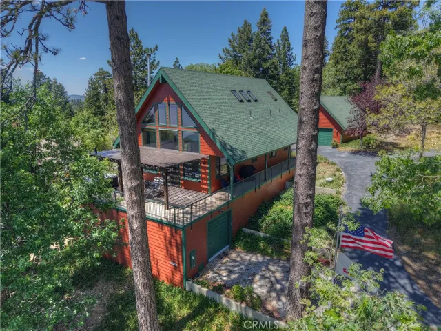 Beautiful Setting With An Oversized Attached Garage And Separate Oversized Multicar Garage