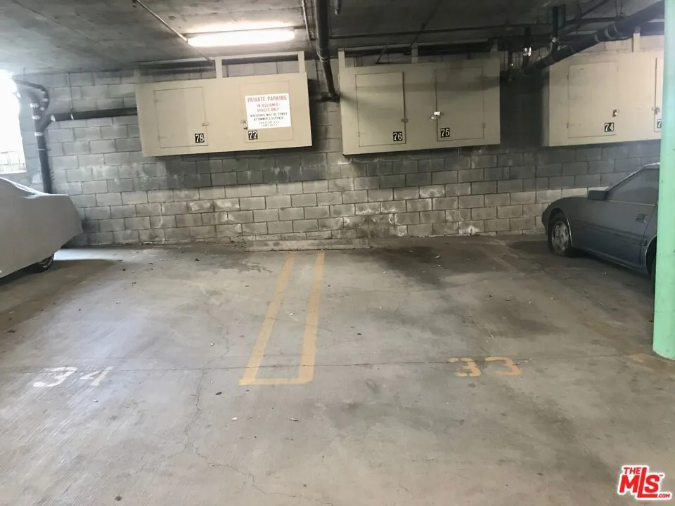 side by side 2 parking spaces