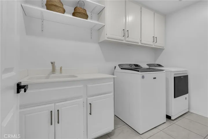 WASHER DRYER INCLUDED WITH LAUNDRY SINK & CABINETS