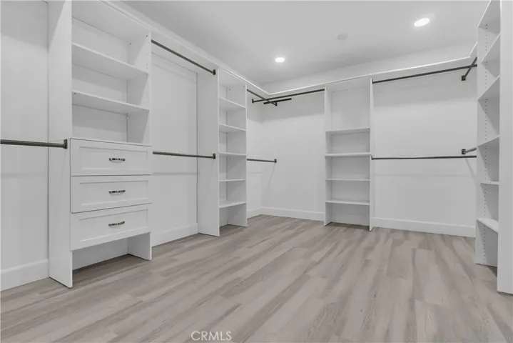 BUILT IN'S CLOSET ORGANIZER IN MASTER BEDROOM