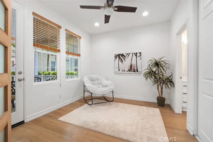 The entry-level private ensuite bedroom includes a patio and direct garage access.