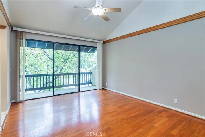 Primary Bedroom with balcony