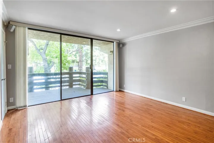 Family room with patio deck facing Warner Park