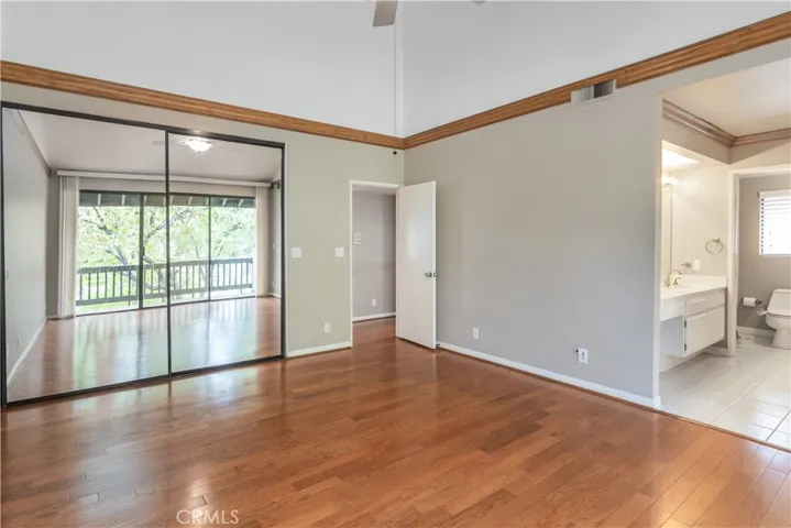 Primary Bedroom with balcony