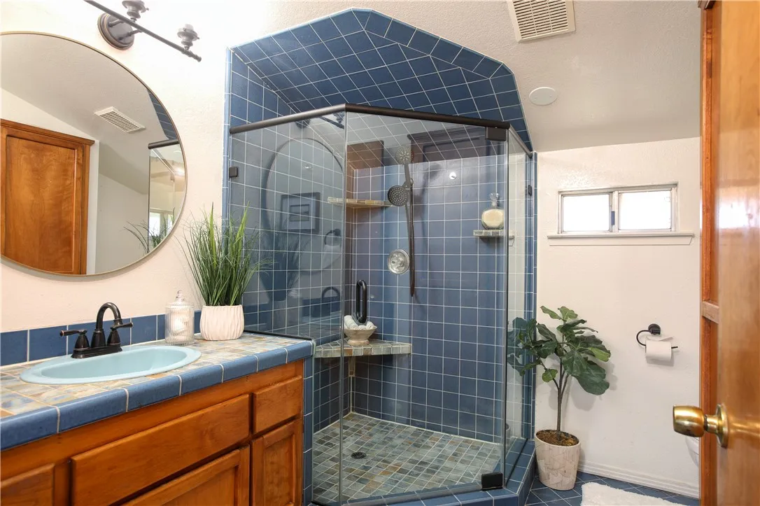 One bedroom unit features a walk in shower
