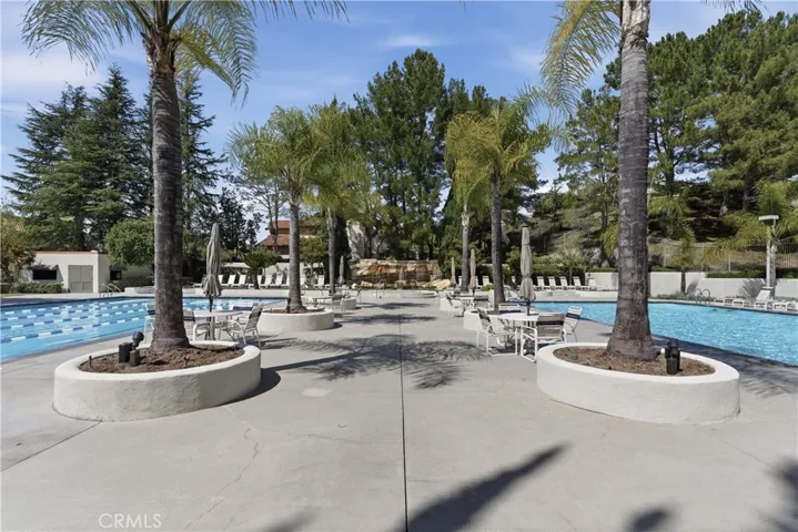 Resort-style community amenities including pools, spa, tennis courts, basketball court, playground, gym, clubhouse, and more.