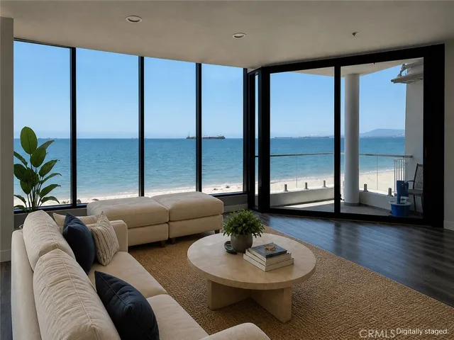 Living Room is unfurnishted. This photo has been digitally staged.
