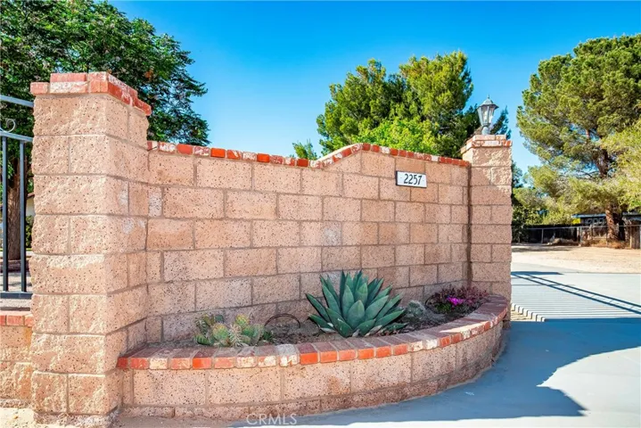 block wall with landscape
