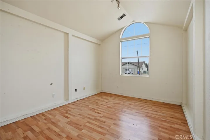 Bedroom 2 has vaulted ceiling.