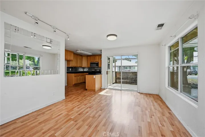 Dining area has slider to deck.