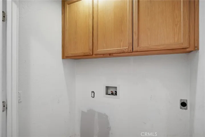 Laundry is in closet off of kitchen.