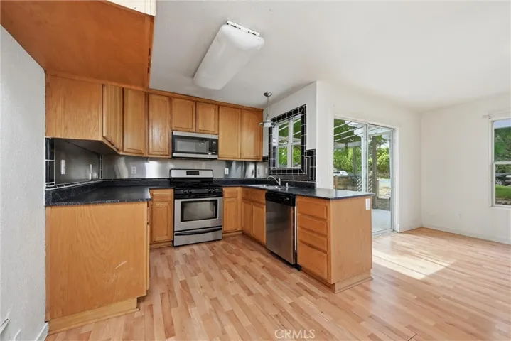 Kitchen is open to dining area.