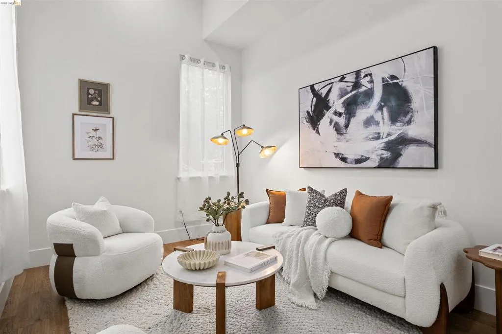 Living room featuring wood finished floors and baseboards