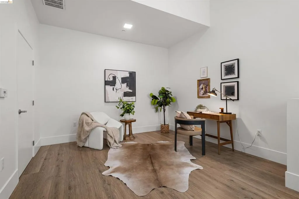 Office area featuring light wood-style flooring