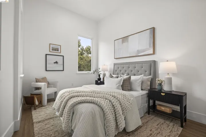 Bedroom with wood finished floors