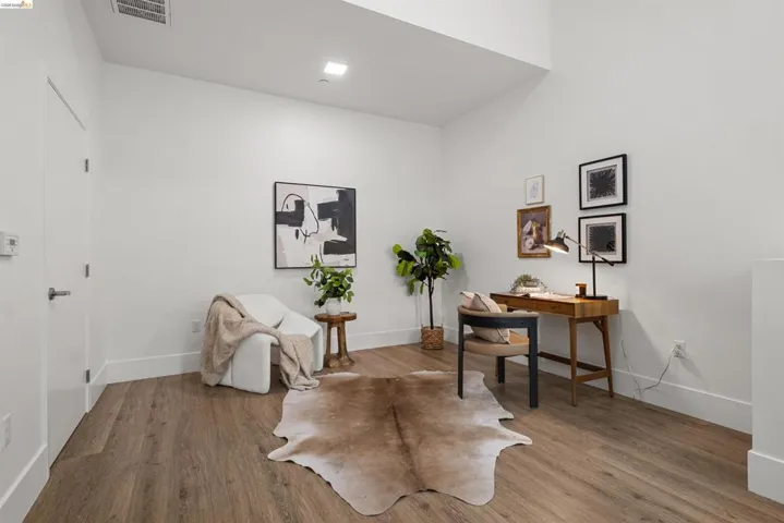 Office area featuring light wood-style flooring