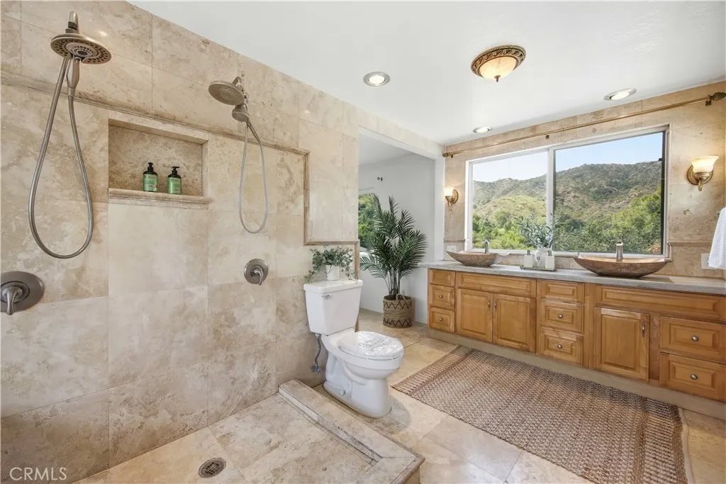 Primary Bathroom Natural Stone and Marble