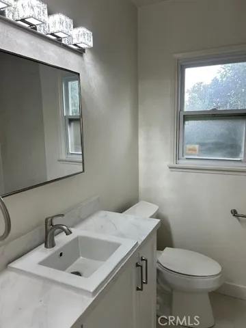 Guest Bathroom with a walk-in shower.