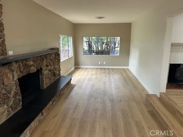 Oversized Living Room with a large mantel fireplace.