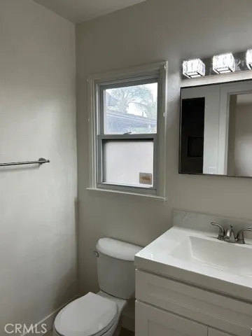 Primary Bathroom with a walk-in shower.