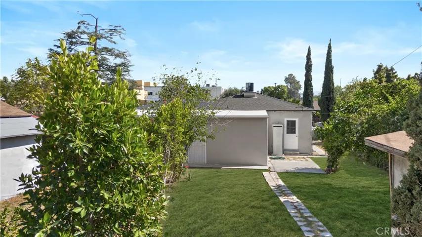 From the rear of the yard. (Grass has been iAI generated)