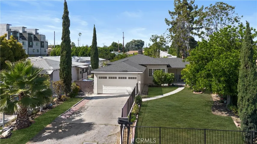 Landscaping was altered/added virtually to show how it could look with grass.