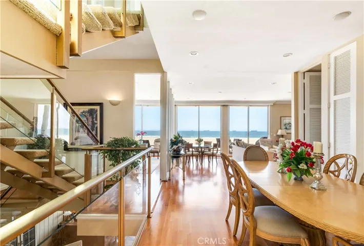 Kitchen open to dining area with views