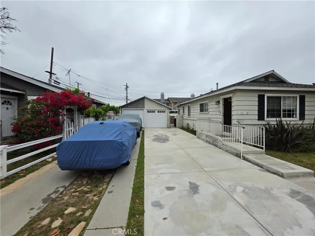 Subject property shares with neighbor the detached 2-car garage sitting right on the property line between the lots.