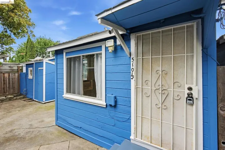 Bright blue exterior with contrasting white trim