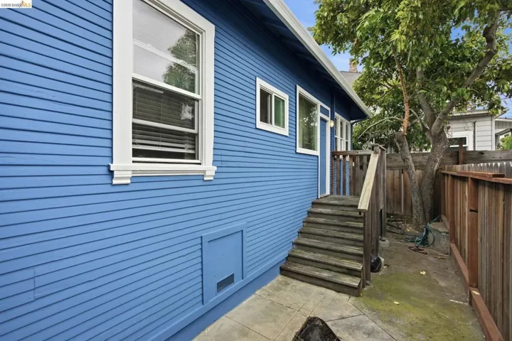 Blue clapboard siding exterior with white trim​​‌​​​​‌​​‌‌​​‌​​​‌‌​​​‌​​‌‌​​‌‌​​‌‌​​​​ windows