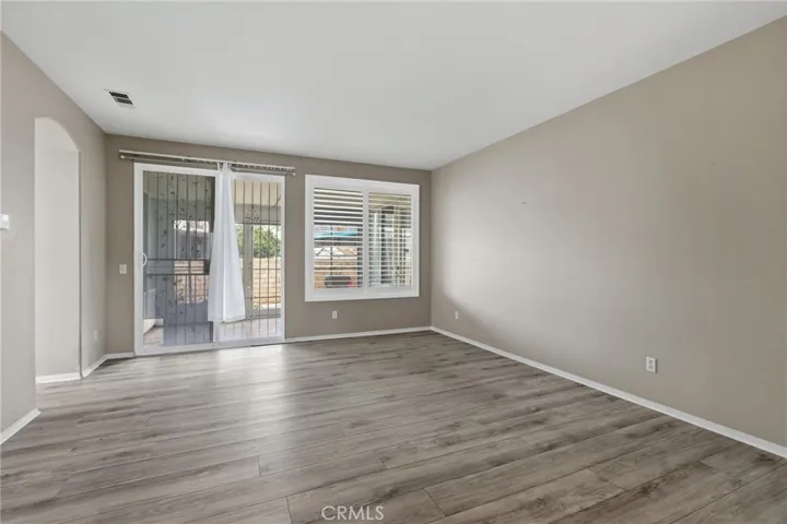 Living Room with Slider to Enclosed Patio