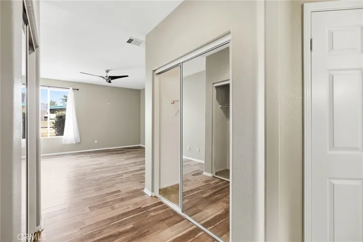 Primary Bedroom has 2 Closets (one is a walk-in closet)