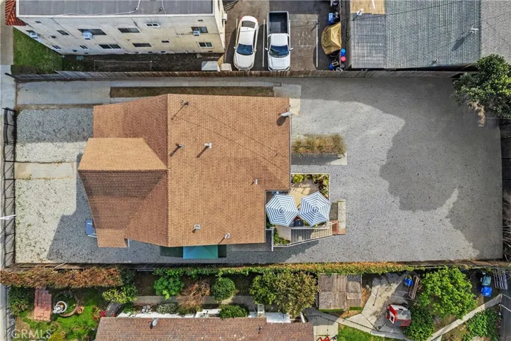 The rear yard was modified to reflect cement at rear yard. There is no cement at rear yard.