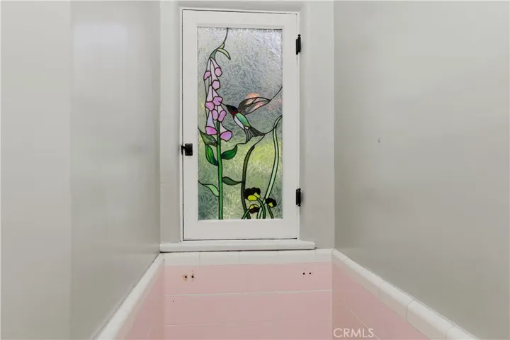 Stain glass window in downatairs bath