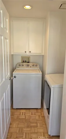 Separate Laundry Room in Kitchen area.