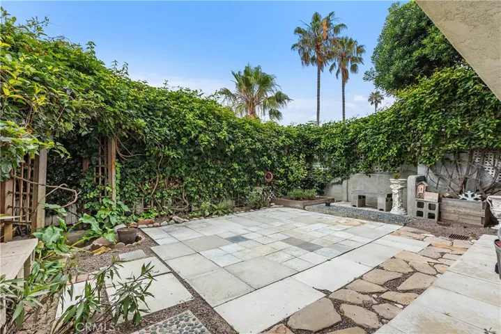 Nice-sized backyard for outdoor entertainment enjoying ocean breezes.